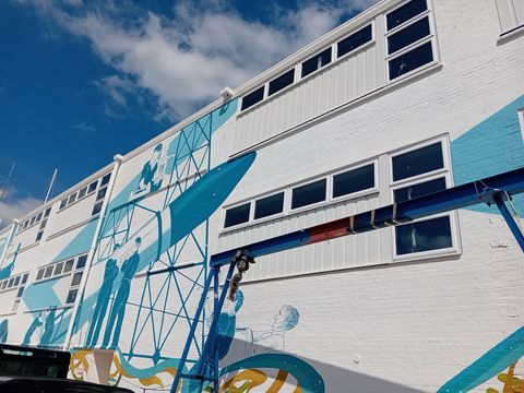 The Columbine Building in East Cowes, with a painted mural on its facade
