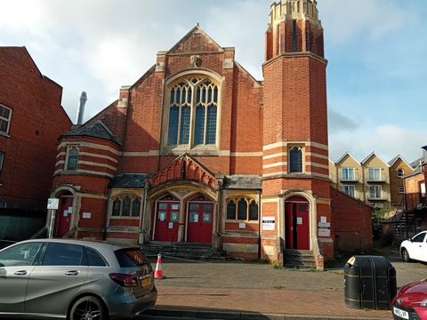 Victorian red brick church with a tall tower in Cowes